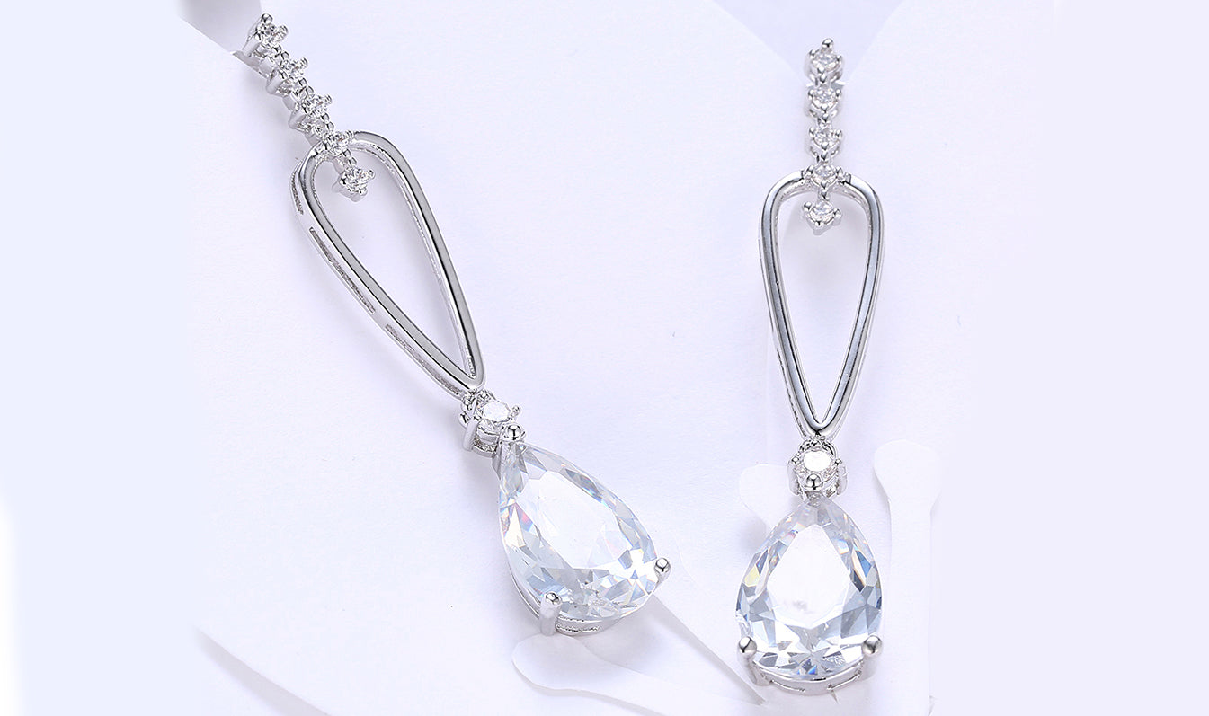 14K White Gold Plating Dangling White Sapphire Pear Cut Earrings